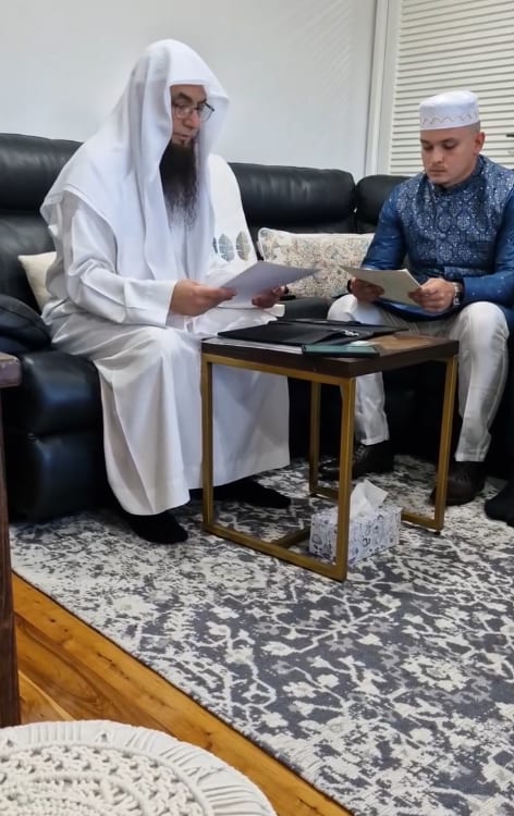 Handing the marriage registration certificate to the groom